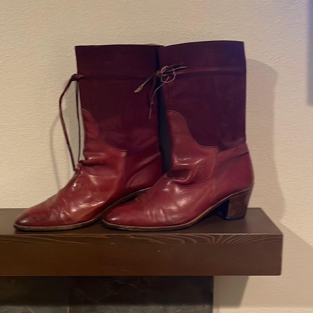 European burgundy style boots with small water spot